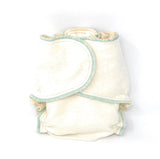 Organic fitted cloth diaper with soft fleece and mint trim, designed to grow with baby from 5 to 35 pounds